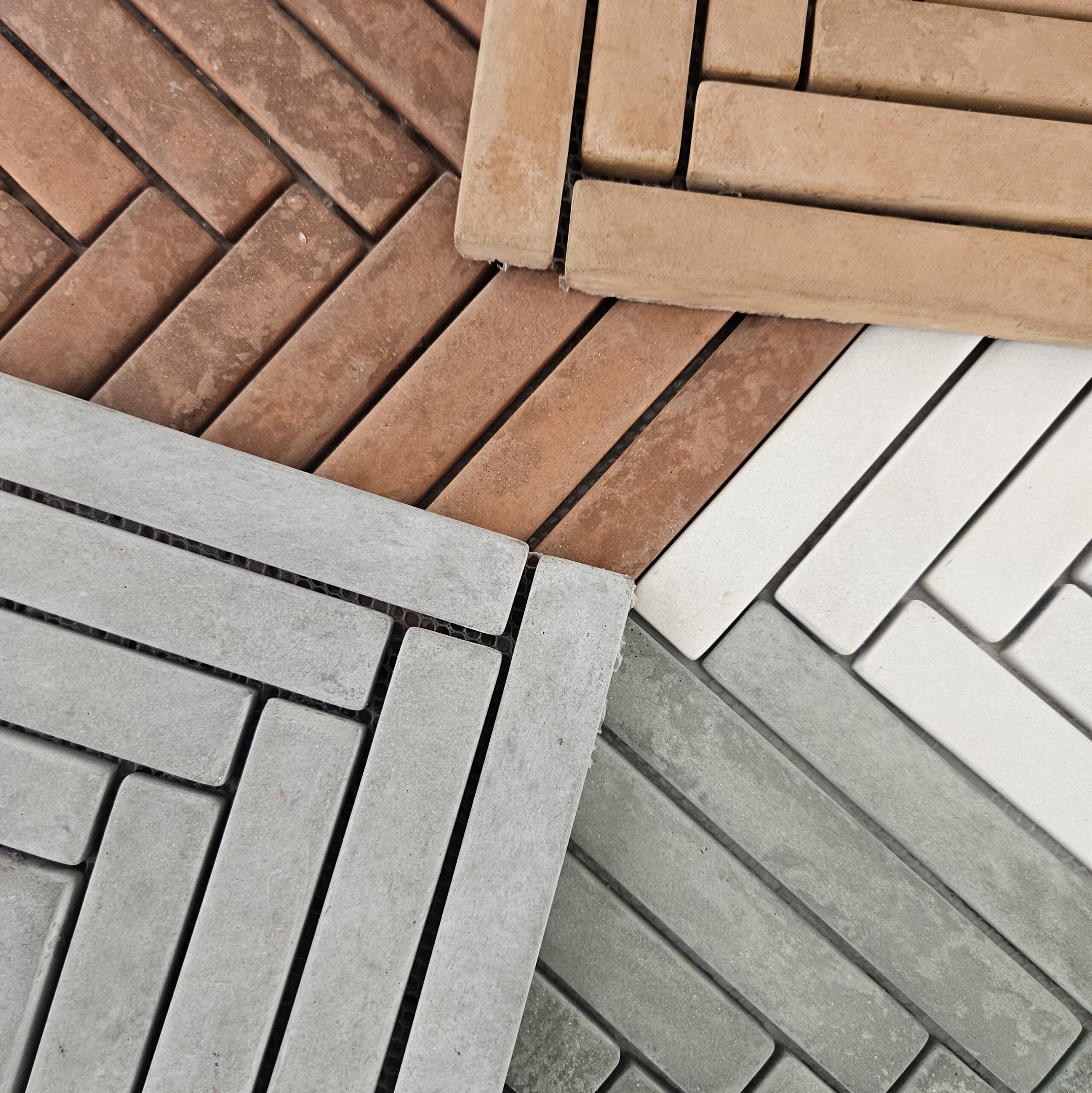 cement look herringbone mosaic